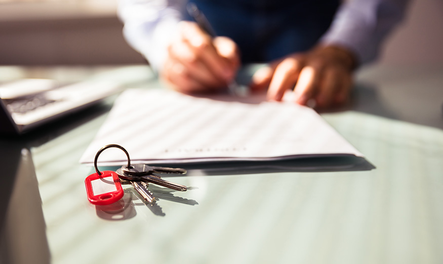 Photo montrant la signature d'un bail