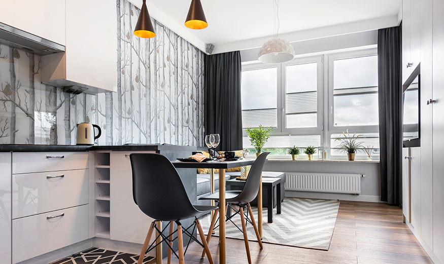 photo d'une cuisine et d'un séjour.